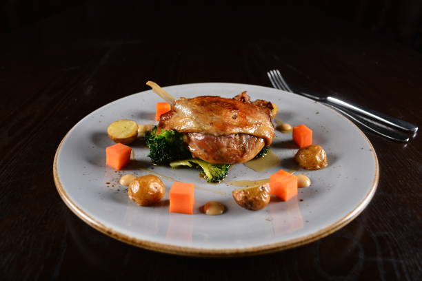 istock chef western marinated grilled duck leg confit with vegetables and sauce main course in plate on white table western restaurant asian halal cafe hotel menu 2055064608