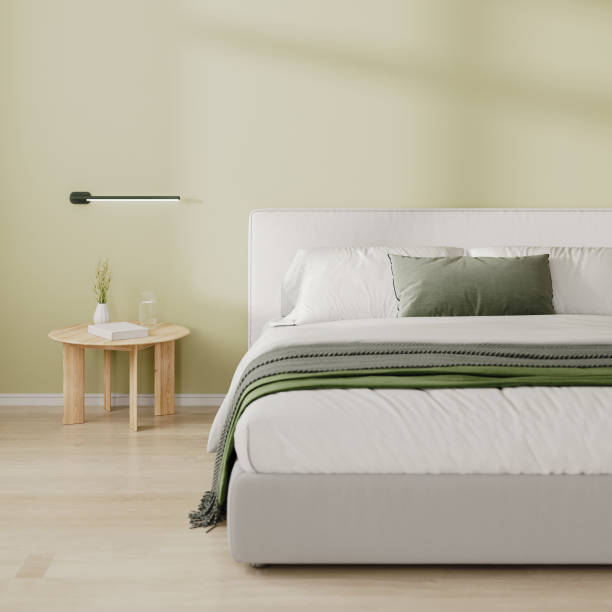 istock Close up of bedroom interior with bed and bedside table with decor, light green wall, 3d render 2055328617