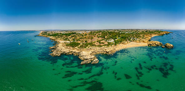 Panoramic aerial drone view of popular Praia do Castelo beach, Albufeira, Algarve, Portugal