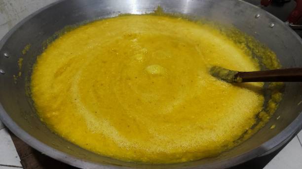 istock Pineapple juice being cooked to make pineapple jam. can be used for slicing the bread or cookies 2055363109