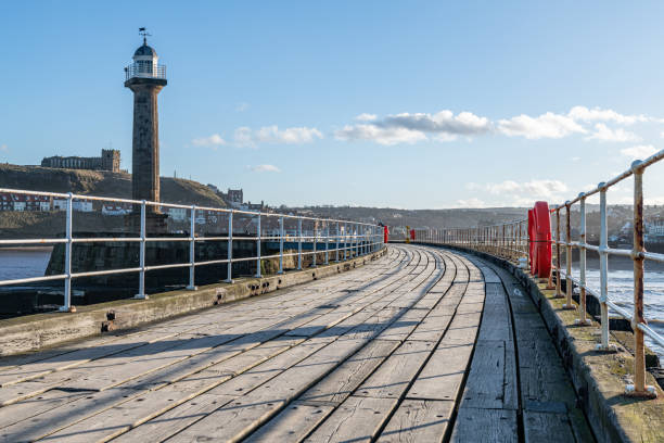 West Pier harbour lighthouse from the Memorial Footbridge, Yorkshire, England