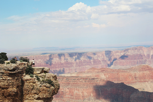 Risking your life for a selfie at the rim of the Grand Canyon