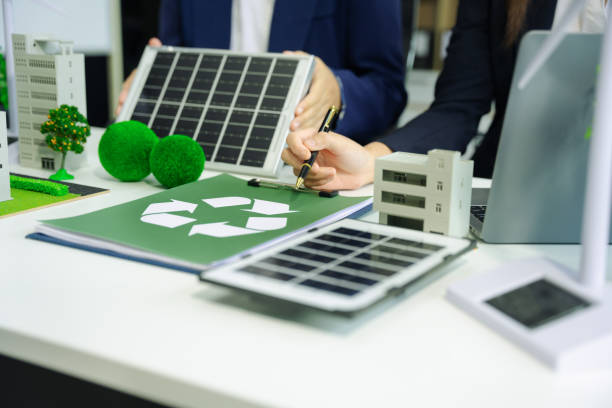 istock Businessman working virtual modern computer to reduce CO2 emissions carbon footprint climate change to limit global warming.Sustainable development and innovation green business concept. 2055545245