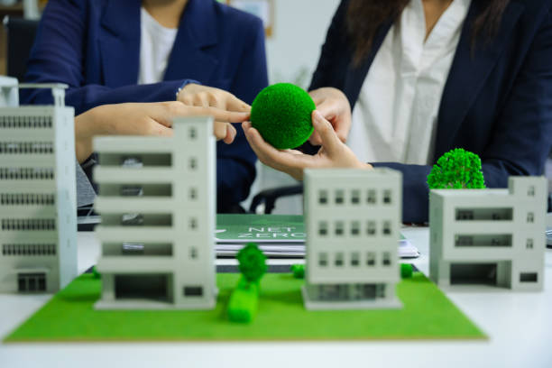 istock Businessman working virtual modern computer to reduce CO2 emissions carbon footprint climate change to limit global warming.Sustainable development and innovation green business concept. 2055545252
