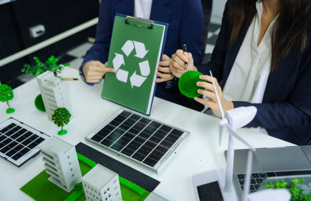 istock Businessman working virtual modern computer to reduce CO2 emissions carbon footprint climate change to limit global warming.Sustainable development and innovation green business concept. 2055545262