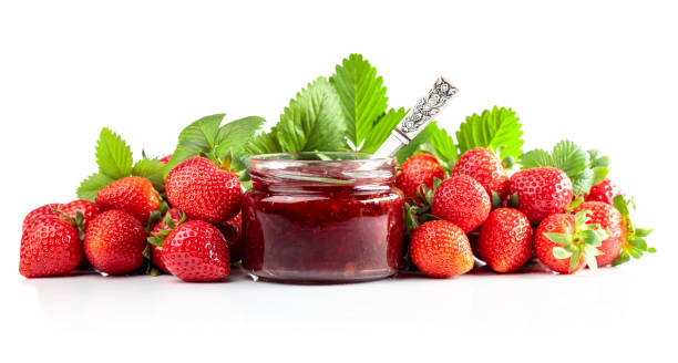 istock Strawberry jam and fresh berries are isolated on a white background. 2055565682