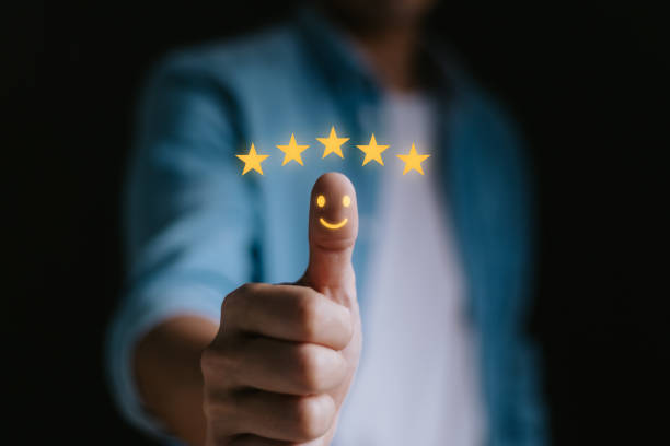 istock Customer satisfaction concept. thumb up Positive emotion smile face and five star with copy space, survey, feedback, standard quality, service. User give rating to service experience, certification. 2055573872