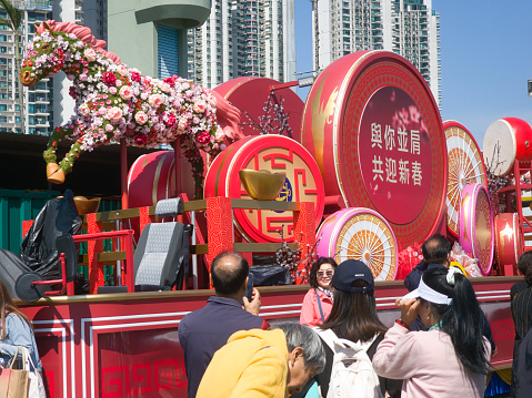Hong Kong, China - February 12 2024: Sha Tin Racecourse, Chinese New Year Raceday, decoration for lucky, people taking photo.