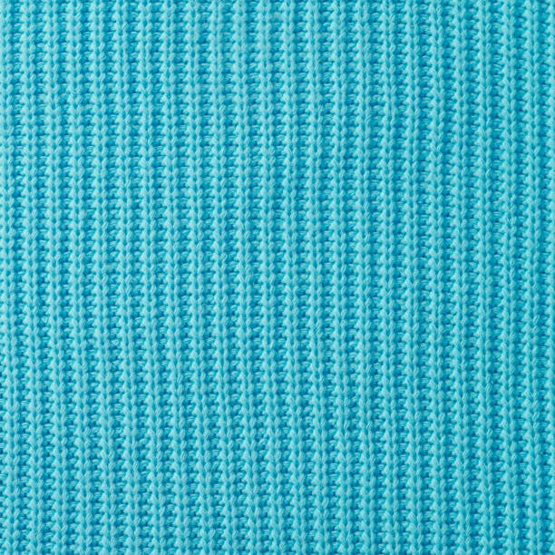 istock Blue knitted texture background. Knitted fabric. Abstract background 2055636528