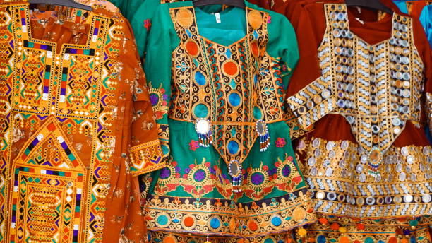 istock Traditional Embroidered Attire. Richly Decorated Garments Displaying Ethnic Craftsmanship and Vibrant Colors 2055637592