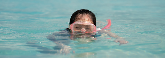 girl snorkeling