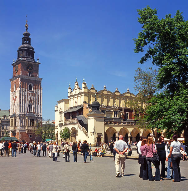 Krakow, Poland - Main Square, Town Hall Tower and Sukiennice on May 21, 2005 in Krakow. Krakow is UNESCO World Heritage Site