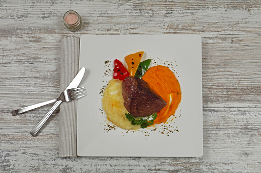 Beef Steak With Pureed Potatoes and Carrots Tabletop