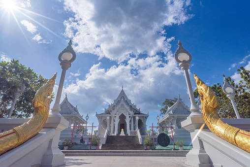 Magnificent white monument of the Kaew temple in Thaïland in Krabi City.

we can see the temple on center of this symmetrical image