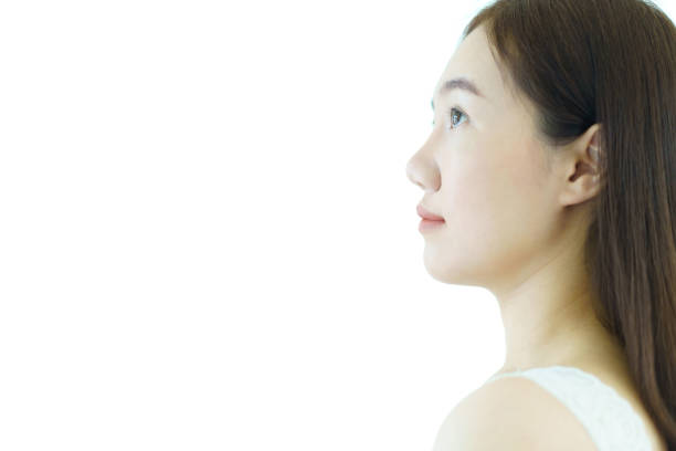 Smart and good looking Asian young businesswoman portrait, businesswoman posing to camera on isolated white background.