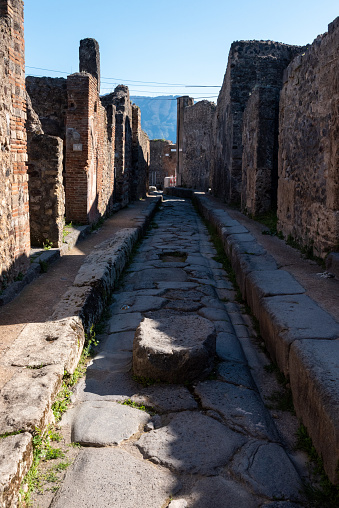 A crosswalk of a typical Roman road in the ancient city of Pompeii, Southern Italy