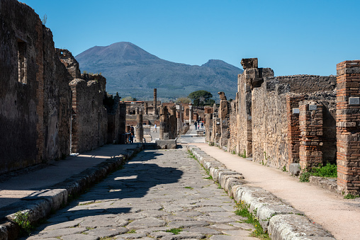 A beautiful typical cobbled street in the ancient city of Pompeii, Southern Italy