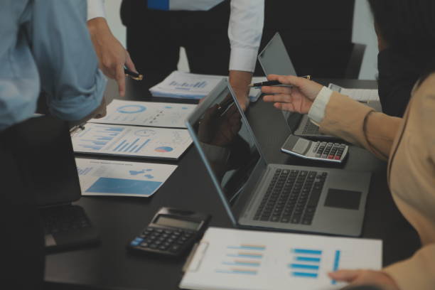 istock Business team collaboration discussing working analyzing with financial data and marketing growth report graph in team, presentation and brainstorming to strategy planning making profit of company. 2055786043