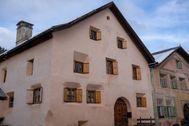 istock Typical, traditional, Engadine house with rich decorations in Guarda, Switzerland 2055795518