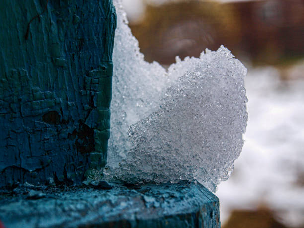 Ice crystals after a cold night on a car roof.