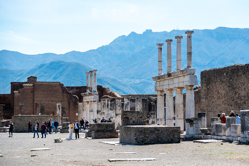 Famous colonnade at the forum of the ancient city of Pompeii, Southern Italy