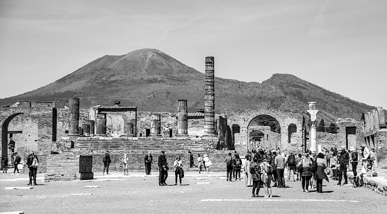 Famous view of the forum of ancient Pompeii, the Vesuvius volcano in the background, Southern Italy