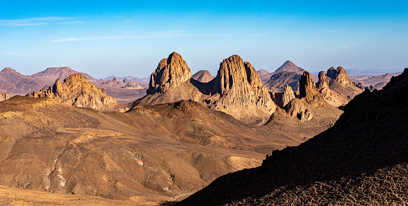 A view of the mountains and basalt organs that stand around the dirt road that leads to Assekrem.