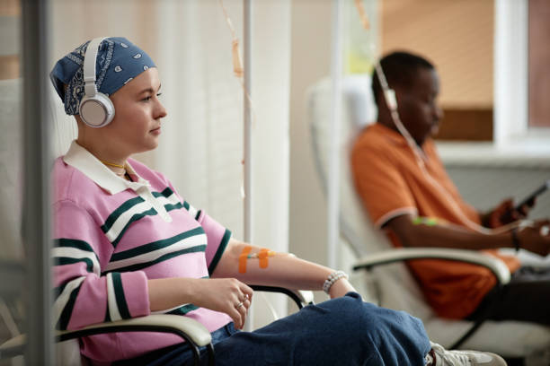 Two People Getting Chemotherapy Treatment in Clinic
