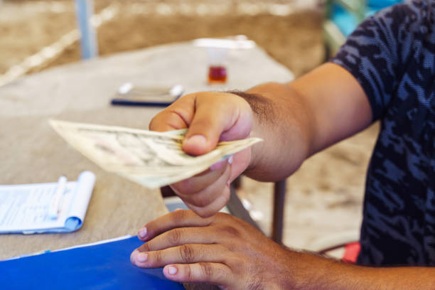 Man handling money.