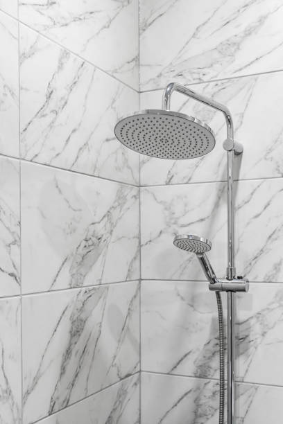 istock shower cabin with wall mount shower attachment in grey 2055866505