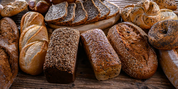 istock Assorted bakery products including loaves of bread and rolls 2055965914
