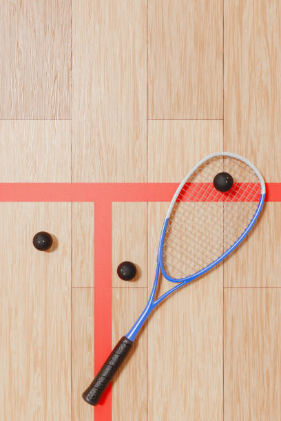 istock Racket and squash balls on the court floor. Top view 3d rendering 2056031198