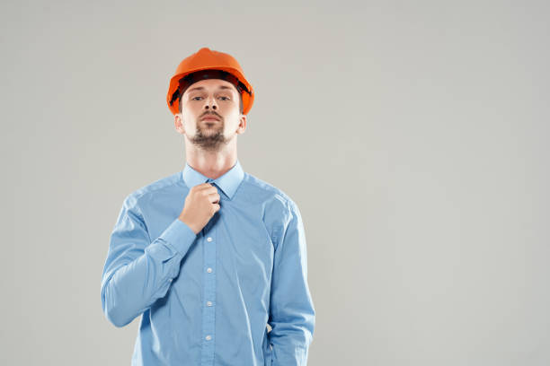 istock male builders protection light background 2056041156