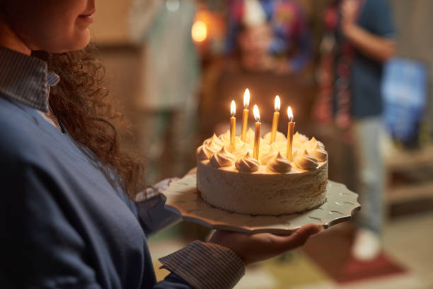 istock Woman Holding Birthday Cake 2056047454