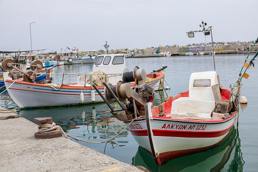 Greece, Serbia - September 21, 2023: Fishing boats in harbor in Platamons, Greece