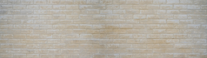 White gray beige brown light damaged rustic brick wall brickwork stonework masonry wallpaper, texture background banner panorama, seamless pattern