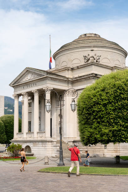 Como, Lombardy, Italy- June 27, 2023; The Volta Temple is a museum dedicated to Alessandro Volta, prolific scientist and inventor of the electric battery. The temple and Volta's portrait appear on the 10,000 lire banknote. The museum houses a collection of scientific instruments used by the physicist, including his first voltaic batteries.
