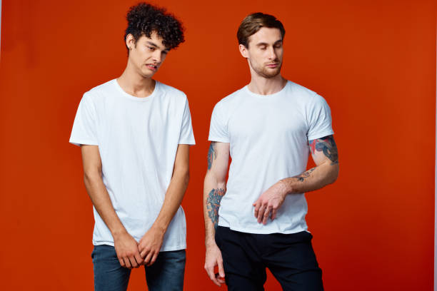 istock two friends t-shirt stand side by side on isolated background studio 2056205868