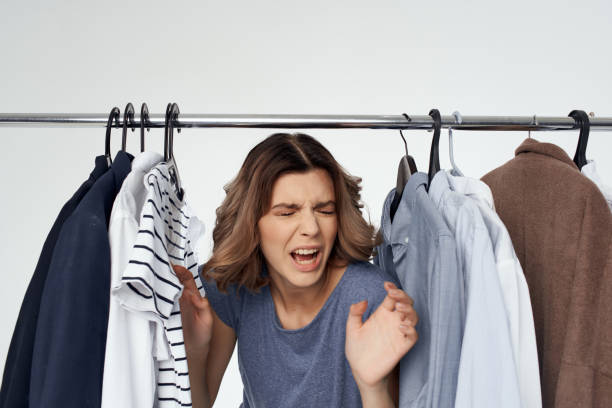 istock woman clothes fitting modern style light background 2056222256