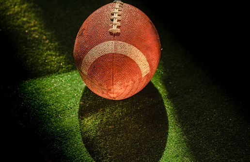 American football ball texture as background