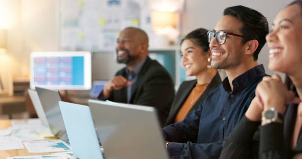 istock Man, presenter and collaboration with team in office for startup, strategy or business planning in New York. People, diversity and laugh at joke for work, technology or online documents for meeting 2056273748