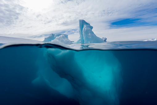 Typically around 80-90 percent of an iceberg mass lies beneath the water.