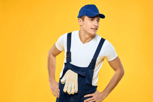 istock Man in working uniform emotions rendering service delivery service yellow background 2056332960