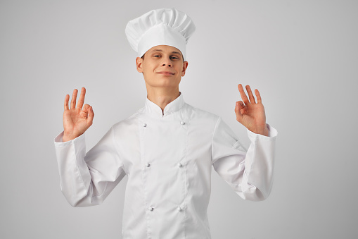 man in chef's uniform work uniform cooking gourmet. High quality photo