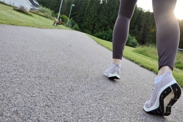 istock A woman running outdoors 2056406824