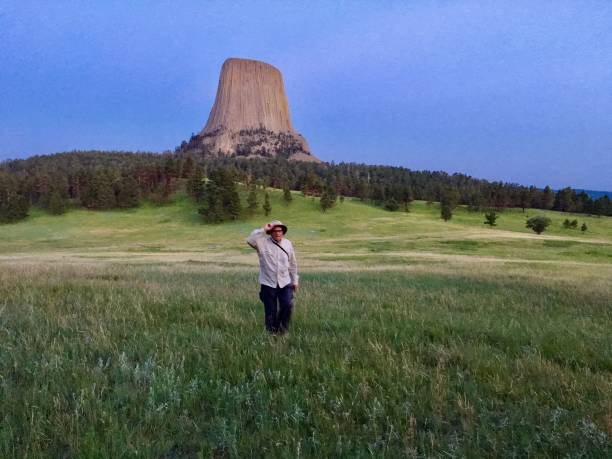 Devils Tower, designated the first national monument by Theodore Roosevelt on September 24th 1906, is a butte composed of igneous rock in the Bear Lodge Ranger District of the Black Hills, near Hulett and Sundance in Crook County, northeastern Wyoming. It rises 1,267 feet above the Belle Fourche River, standing 867 feet from summit to base and 5,112 feet above sea level. July 6, 2018 at 9:06 PM.