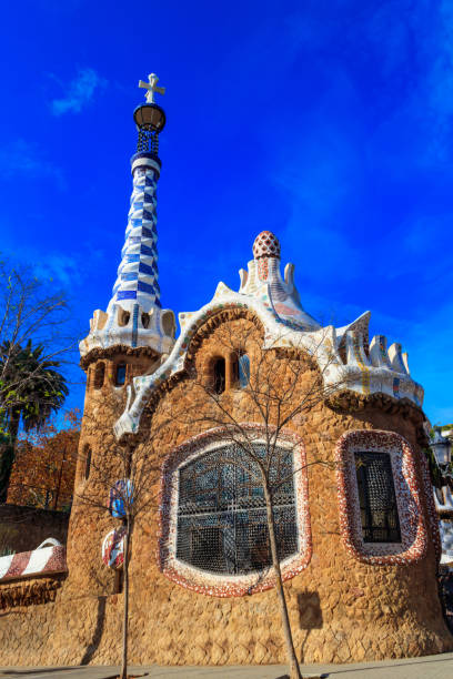 fairytale gingerbread house in park guell designed by antoni gaudi in barcelona, spain - castle catalonia spain majestic foto e immagini stock