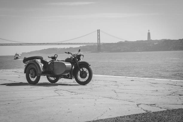 istock Vintage Vibes: Classic Motorcycle by the Riverside 2056703097