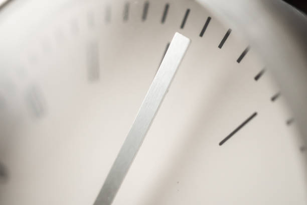 Antique clock showing time passing quickly with motion blur effect