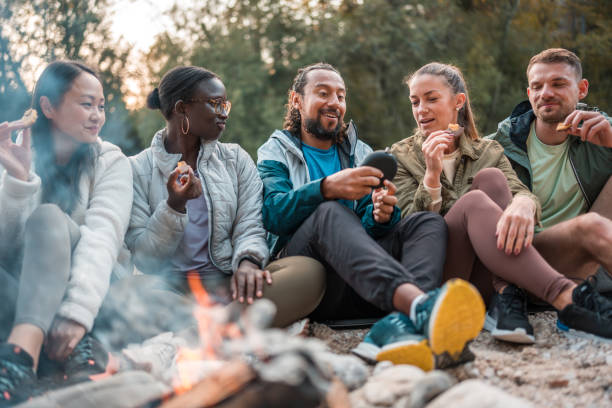 istock Happy Mixed Race Friends Sharing Outdoor Happiness 2056741629
